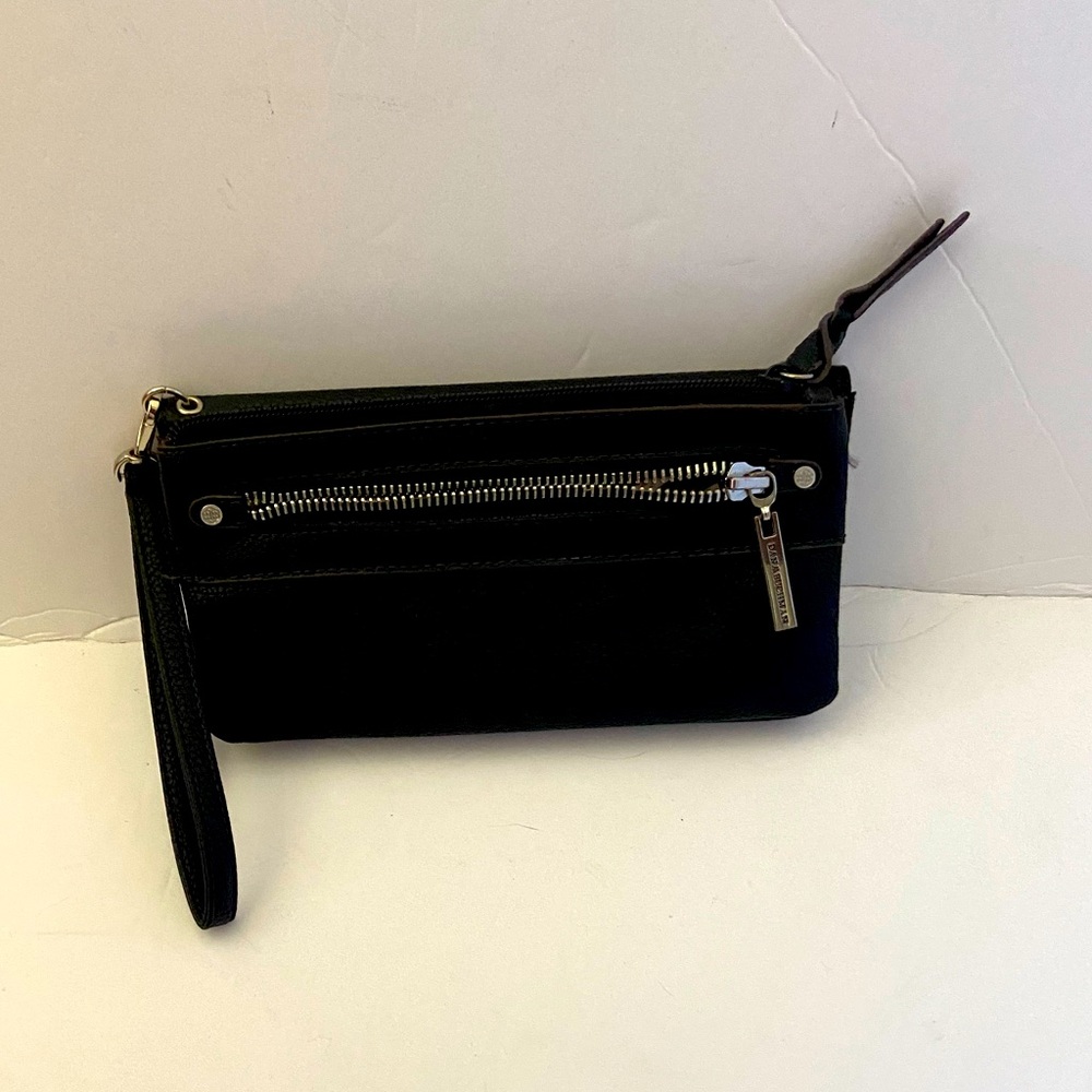 Brown Dana Buchman wristlet. 4 x 8 x 1 inches. Almost new.  Excellent condition